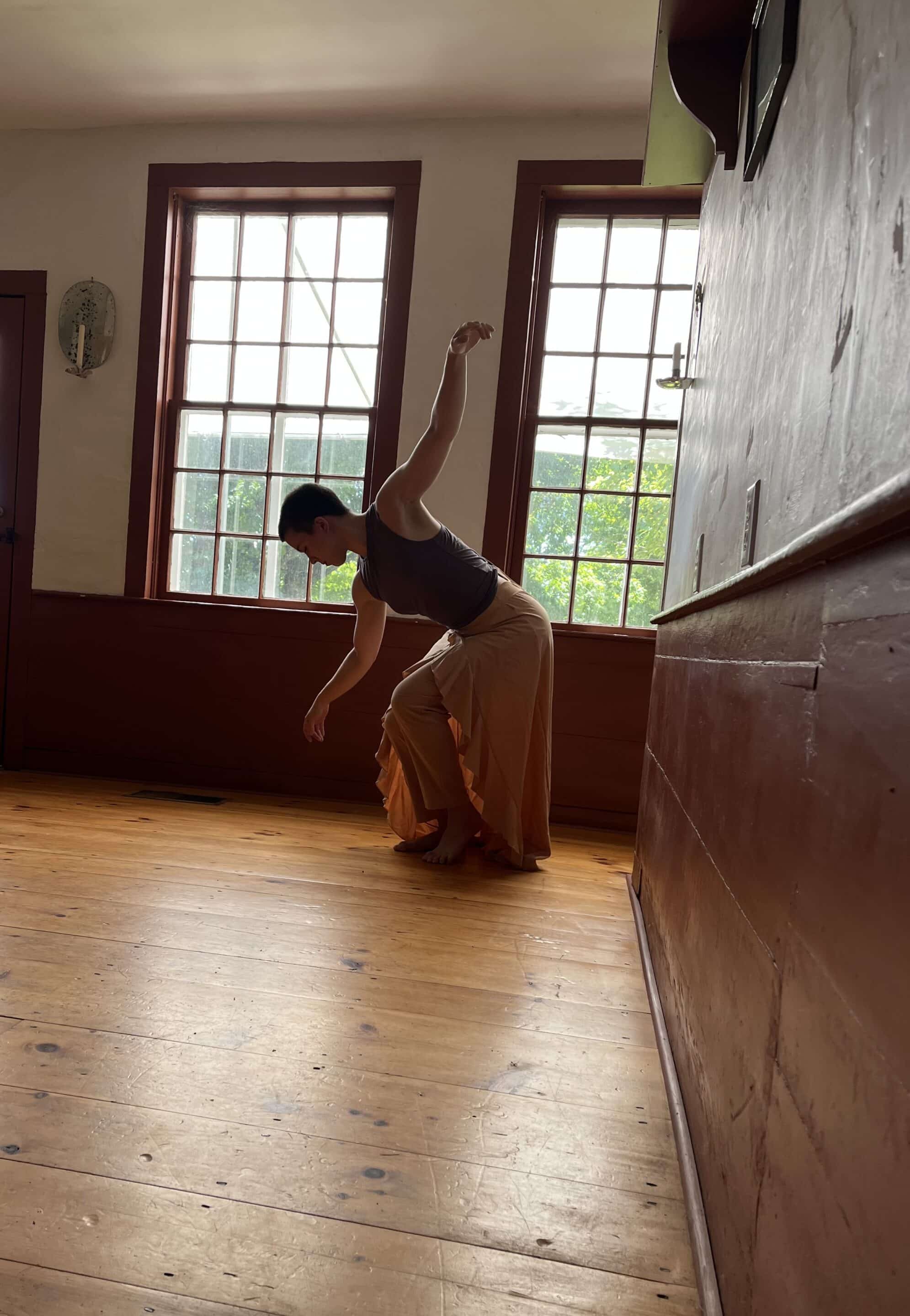 (Solo dancer Katie Corkcum in “Not my mother’s pious daughter” performance at The Samuel Reed Hall House, photo by Adelle Brunstad)